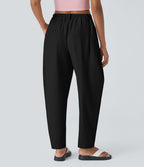 Pantalon tailleur ample, taille moyenne, coupe barrel, à poches