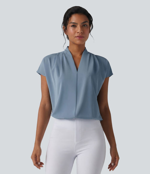 Blouse esprit bureau ample défroissage facile, col V et manches chauve-souris