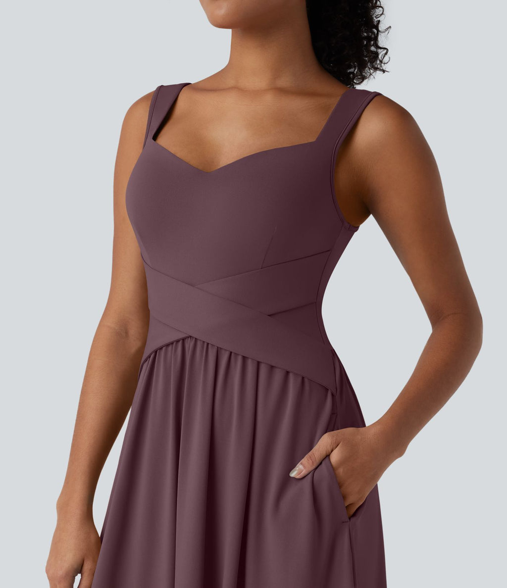 Robe midi fluide sans manches dos croisé ouvert avec poches