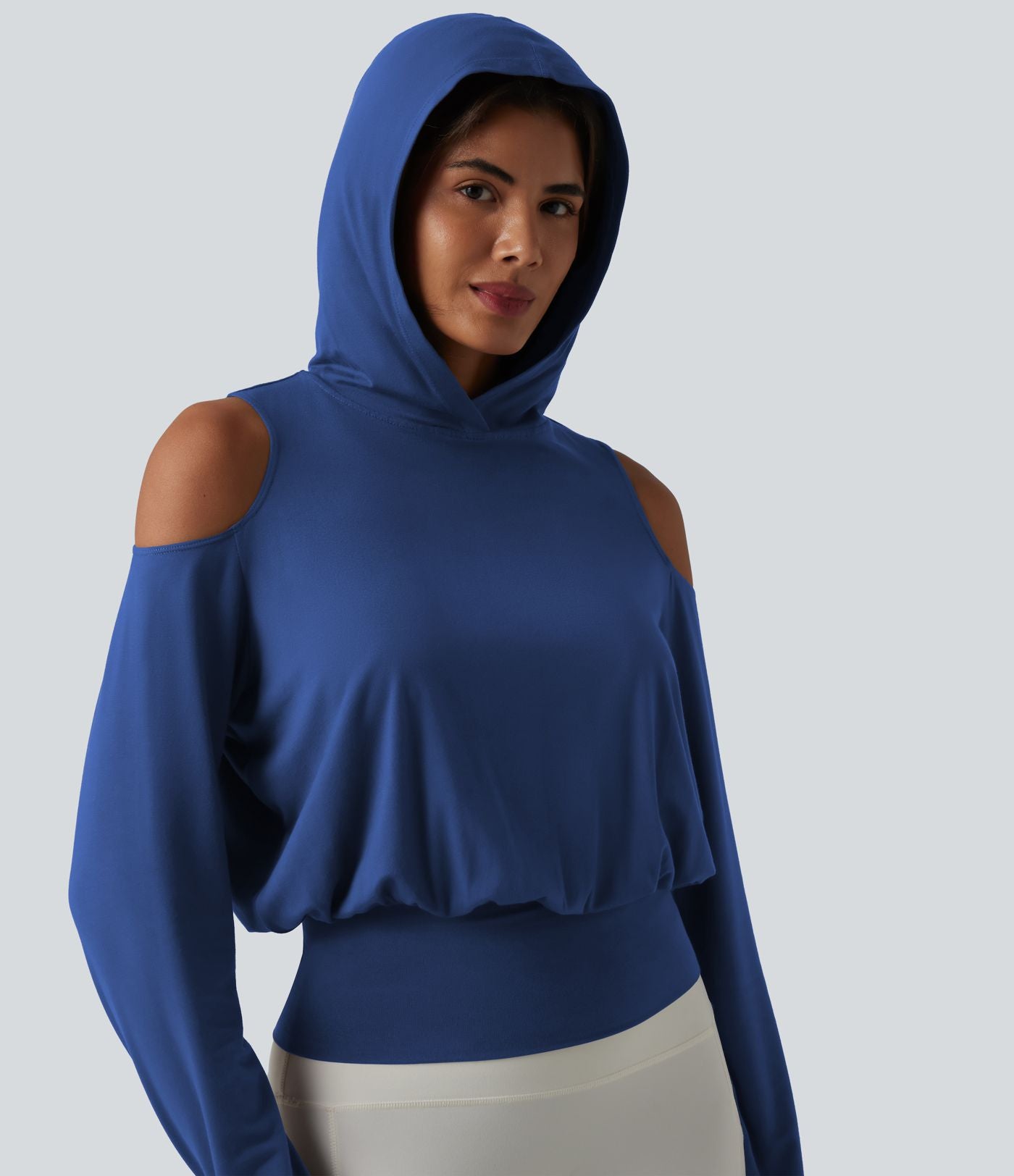 Sweat-shirt de sport à capuche épaules dénudées manches longues