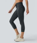 Legging corsaire de yoga taille haute à rayures avec cordon de serrage et poches