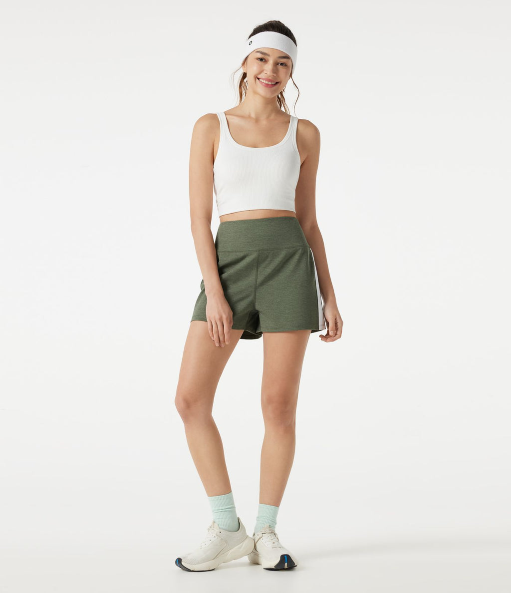 Short baggy de sport taille haute à séchage rapide avec bandes latérales et poches