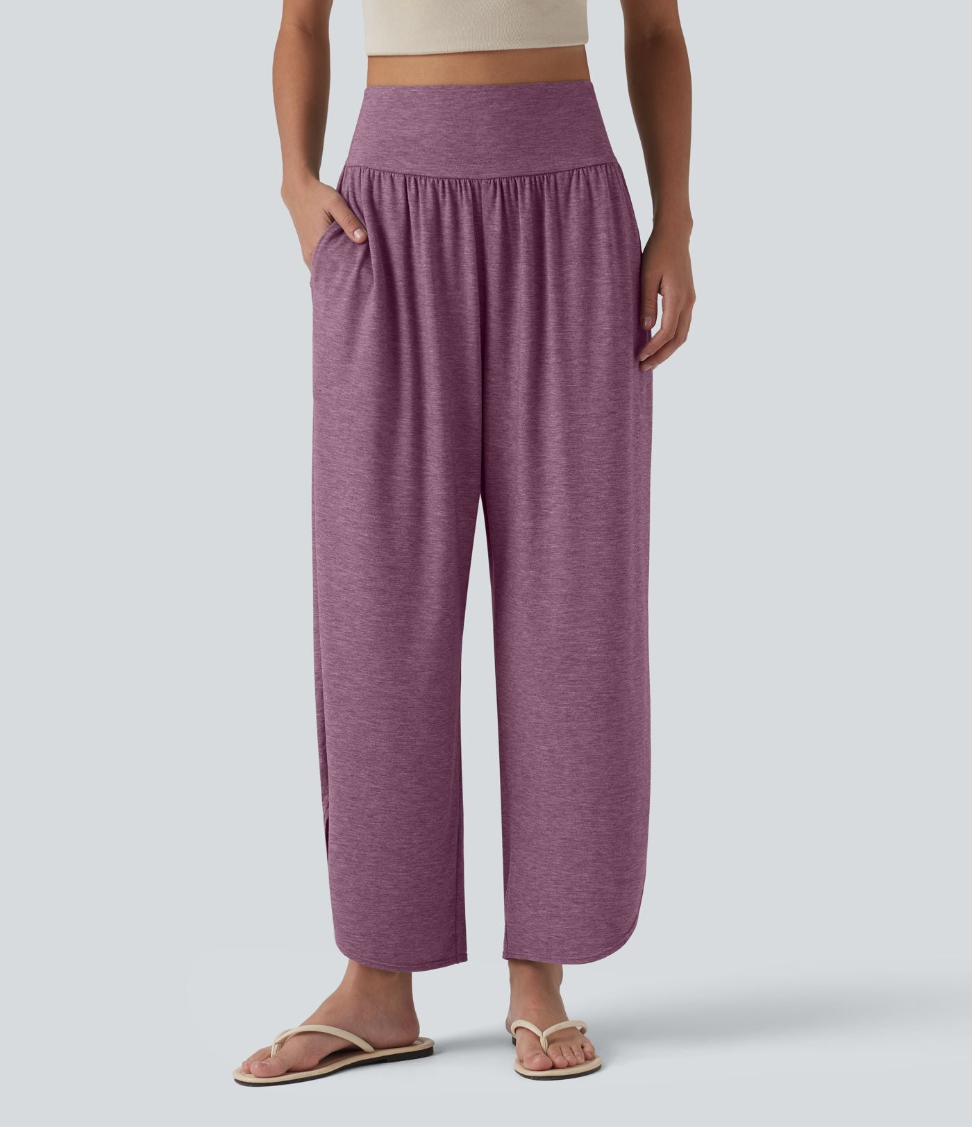 Pantalon décontracté taille haute gainant avec ourlet arrondi et poches