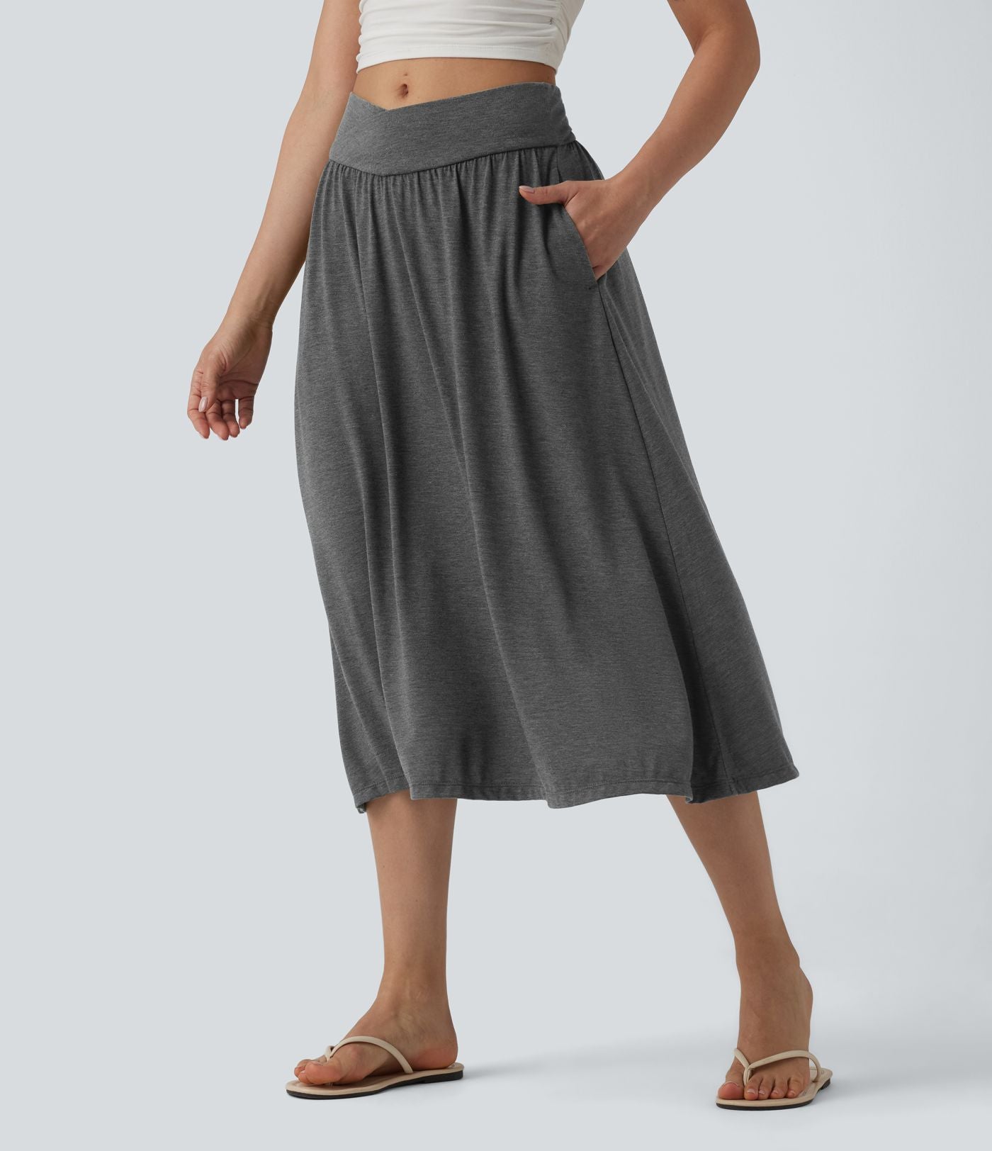 Jupe midi casual fluide croisée taille haute avec poches