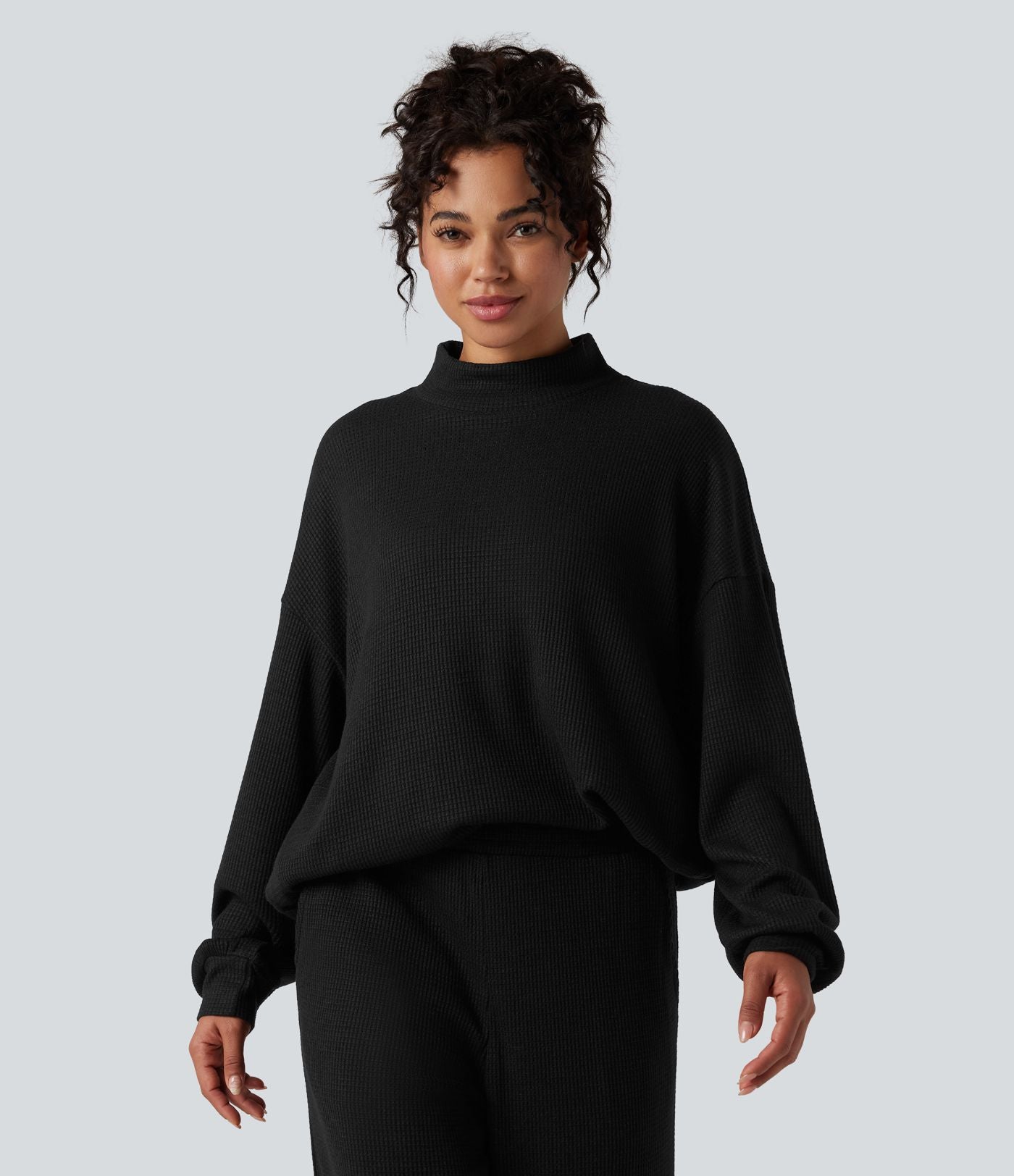 Sweat-shirt gaufré col montant manches longues coupe décontractée avec poches