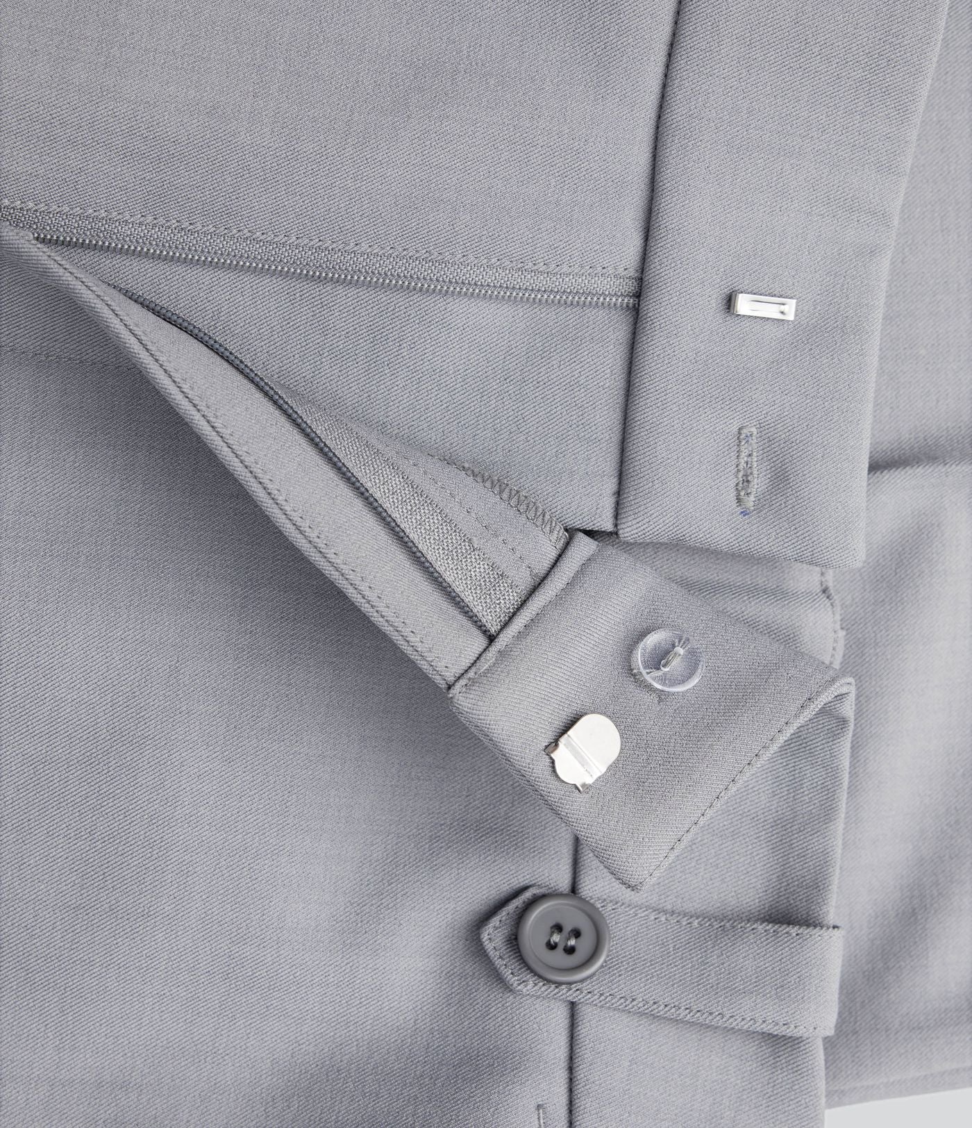 Pantalon de costume taille moyenne longueur cheville jambe droite avec poches latérales