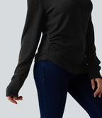 T-shirt décontracté semi-transparent une épaule dénudée à manches longues et ourlet asymétrique