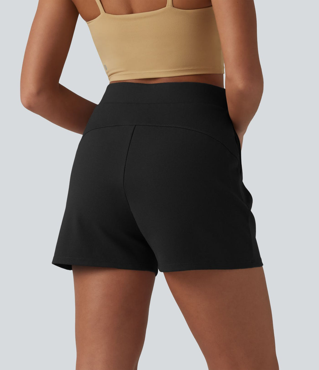 Short tailleur plissé taille haute avec poches