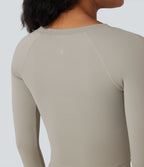 Haut de sport yoga court SoftlyZero™ QuickDry découpes manches longues avec trous pour pouces