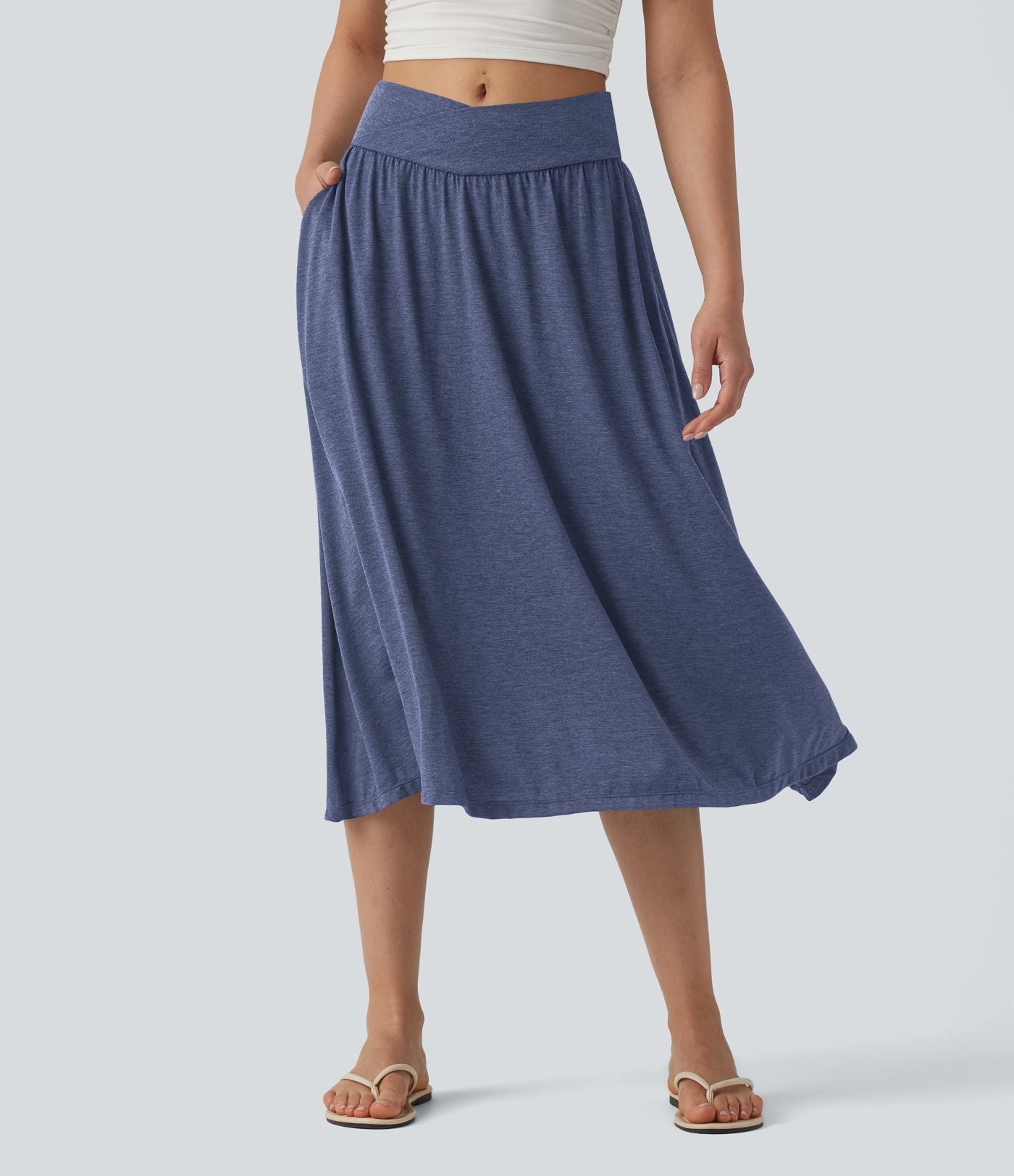 Jupe midi casual fluide croisée taille haute avec poches