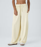 Pantalon Large Fluide Taille Mi-Haute Taille Élastique Cordon Poches Latérales Ourlet Flottant