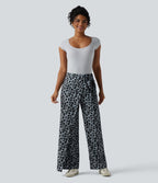 Pantalon tailleur large taille haute imprimé léopard avec liens latéraux