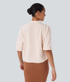 Blouse aspect lin col rond, manches mi-longues, boutonnée avec ourlet arrondi pour la détente