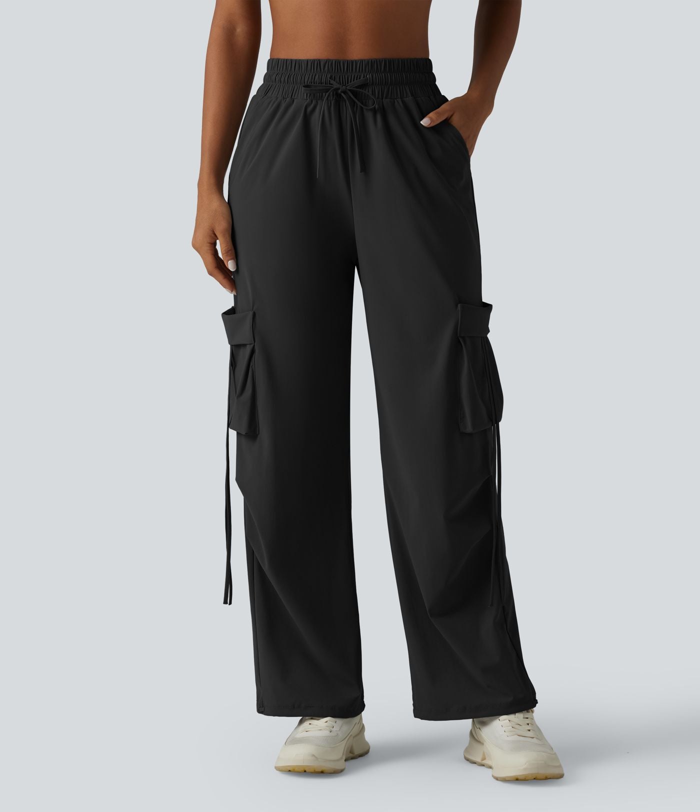 Pantalon cargo large fluide d'entraînement taille haute avec cordon de serrage, séchage rapide, à effet frais InstantCool et poches, protection solaire UPF40+
