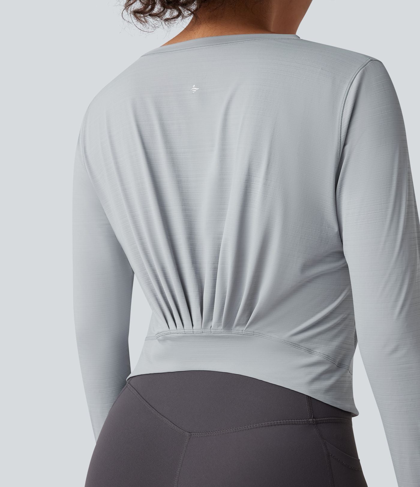 Haut de sport yoga col rond à manches longues avec détails plissés et poche