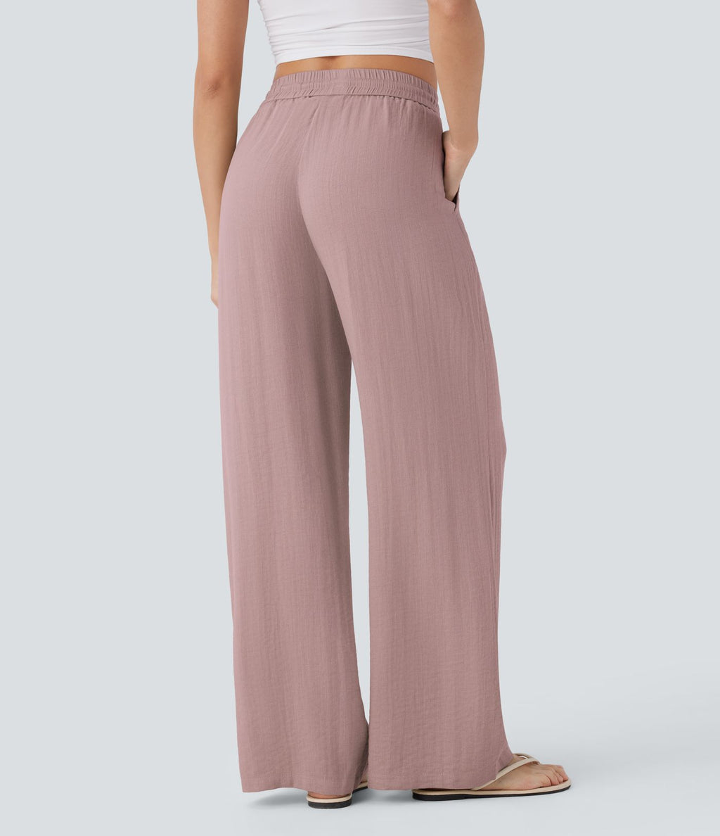 Pantalon large fluide taille haute avec cordon de serrage, poches latérales et aspect lin
