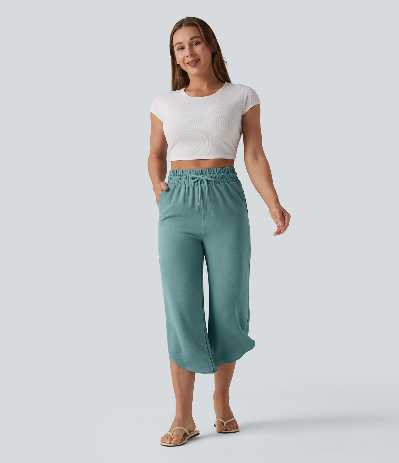 Pantalon casual 7/8 taille haute aspect lin à cordon de serrage et ourlet arrondi avec poches