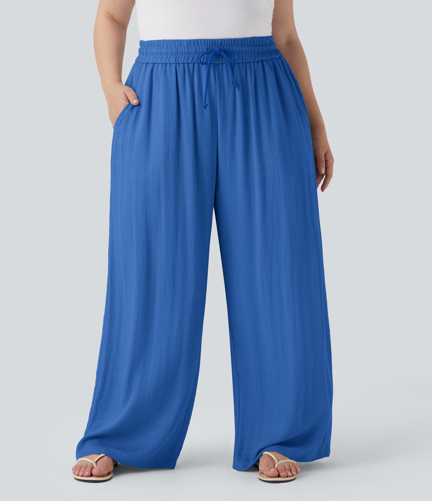 Pantalon décontracté grande taille large fluide taille haute effet lin avec cordon de serrage et poches
