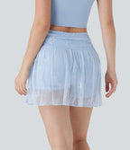 Mini-jupe de soirée taille haute 2-en-1 avec poche latérale et dentelle