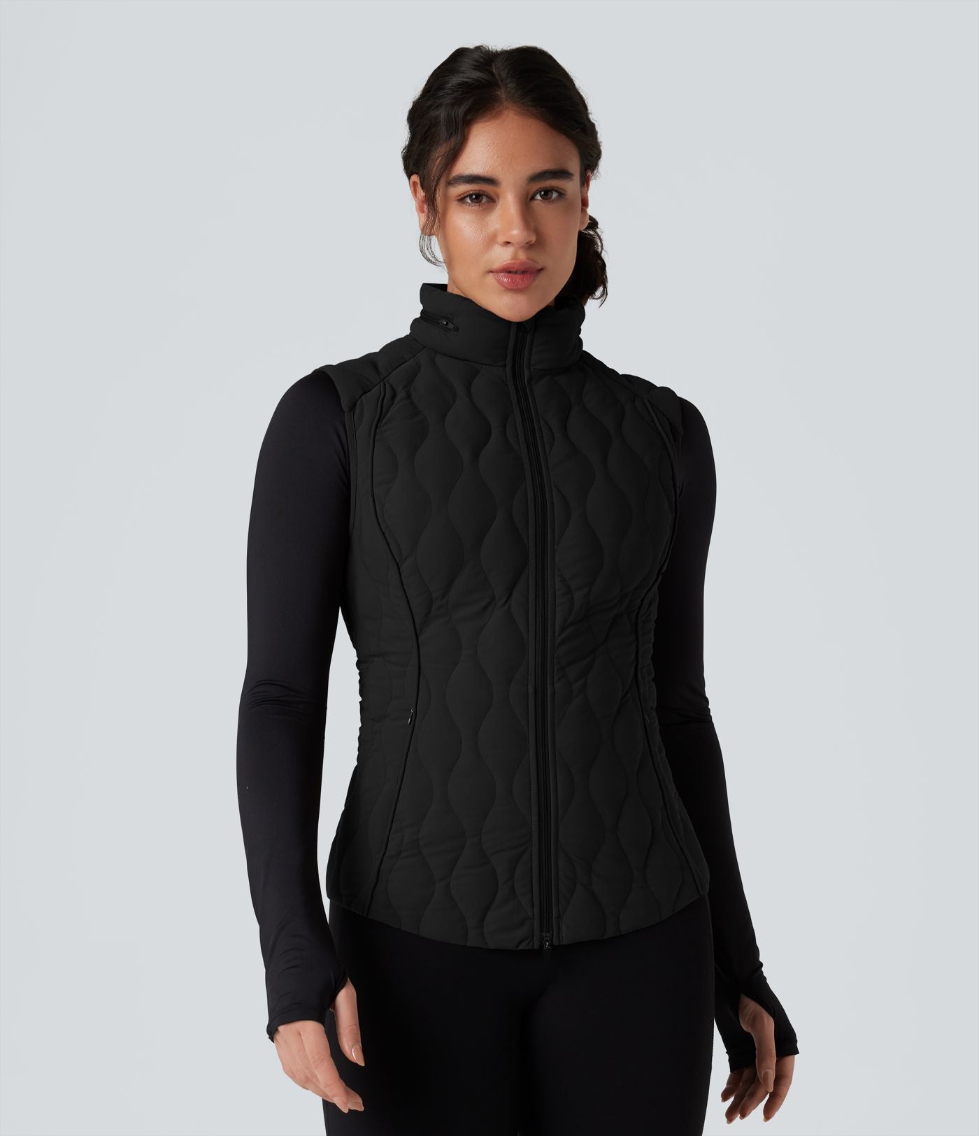 Gilet matelassé running PuffFlex col montant avec zip pliable avec poches