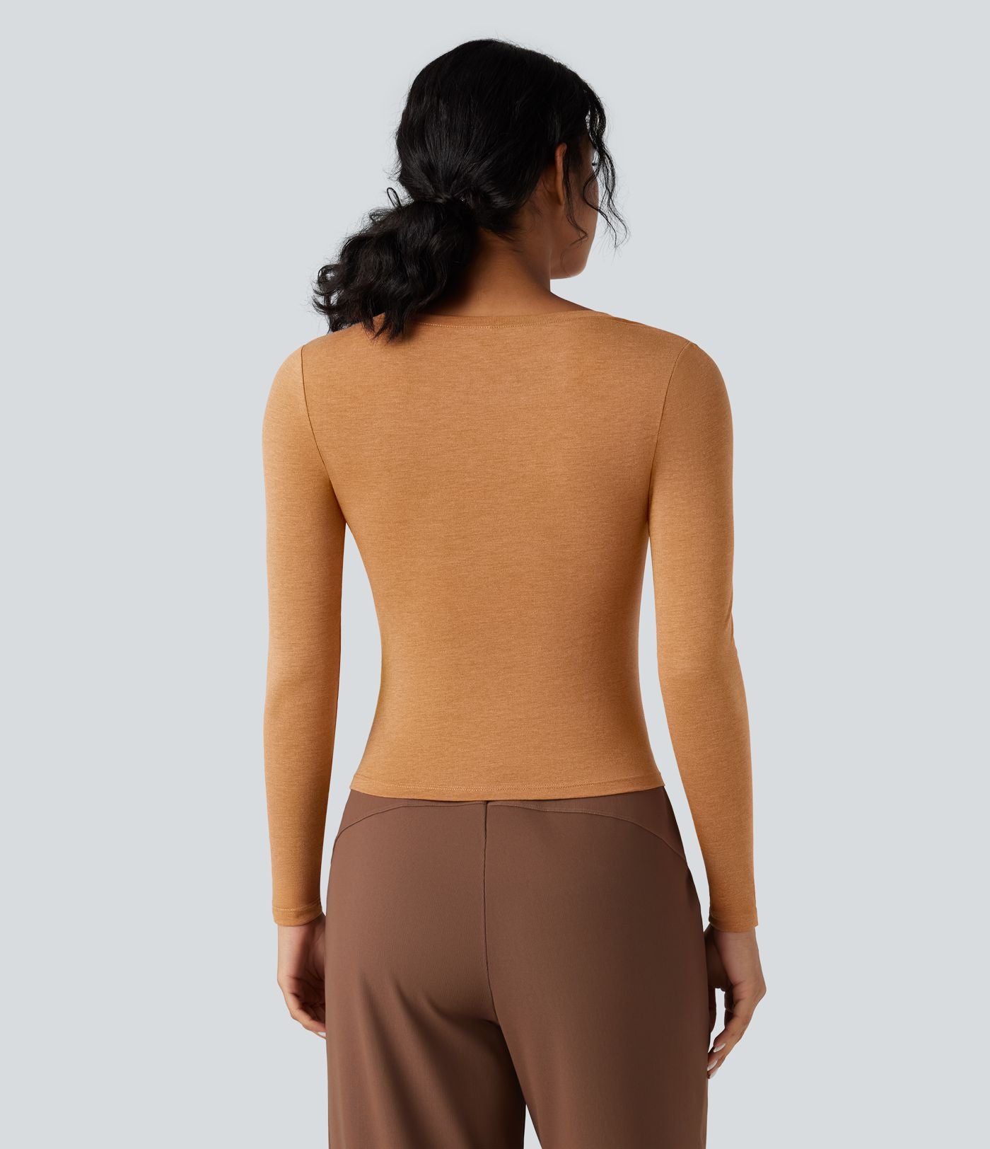 T-shirt tailleur col rond ourlet asymétrique manches longues