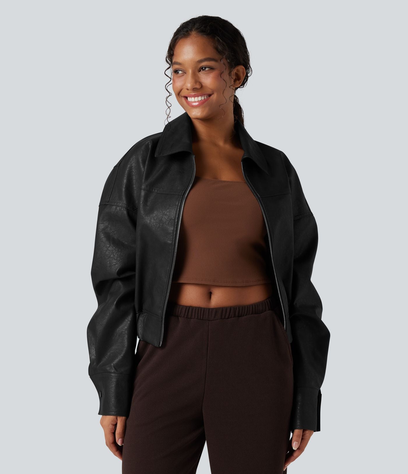 Veste décontractée en tissu enduit à fermeture éclair et manches longues avec poches