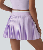 Jupe mini de tennis plissée 2-en-1 Breezeful™ color block taille haute à séchage rapide avec poches