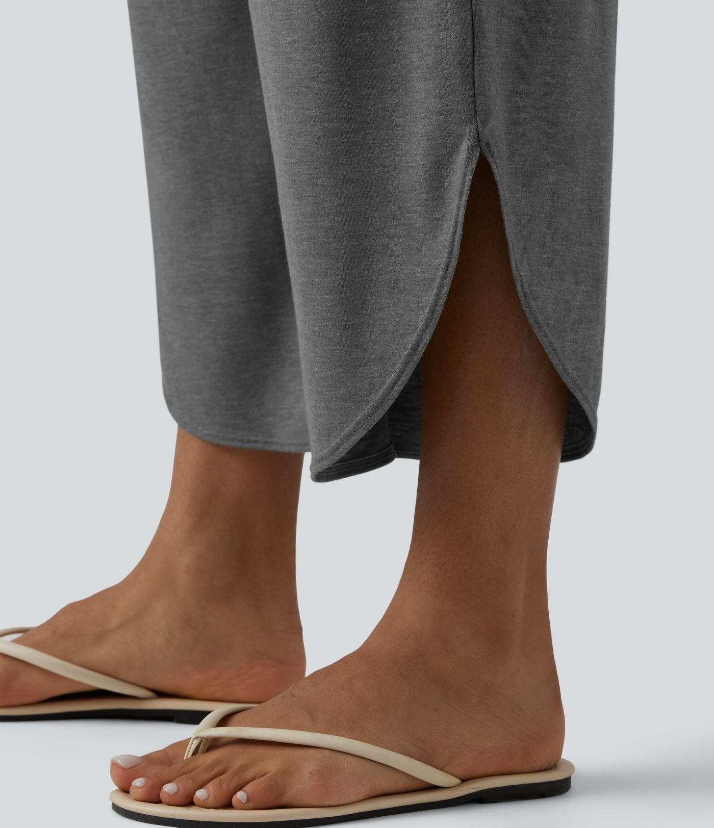 Pantalon décontracté taille haute croisé à ourlet courbe avec poches