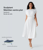 Robe de travail mi-longue fluide gainante à manches chauve-souris avec poches