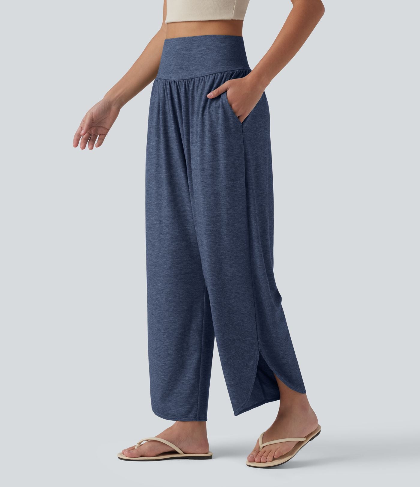 Pantalon décontracté taille haute gainant avec ourlet arrondi et poches