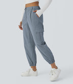 Jogging cargo décontracté taille moyenne à bouton, fermeture éclair, plis et poches multiples