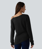 T-shirt décontracté semi-transparent une épaule dénudée à manches longues et ourlet asymétrique