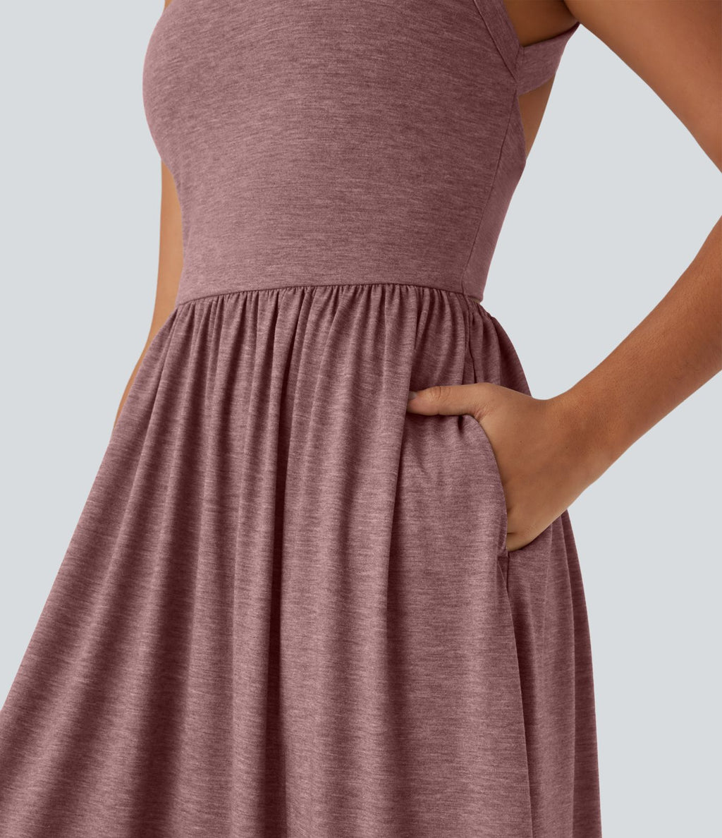 Robe longue fluide fendue avec poches latérales, dos nu et effet torsadé