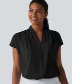 Blouse esprit bureau ample défroissage facile, col V et manches chauve-souris