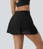 Mini-jupe de yoga taille haute avec short intégré, poches latérales et empiècements en maille contrastée avec fentes