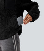 Veste sherpa col roulé manches longues avec poches