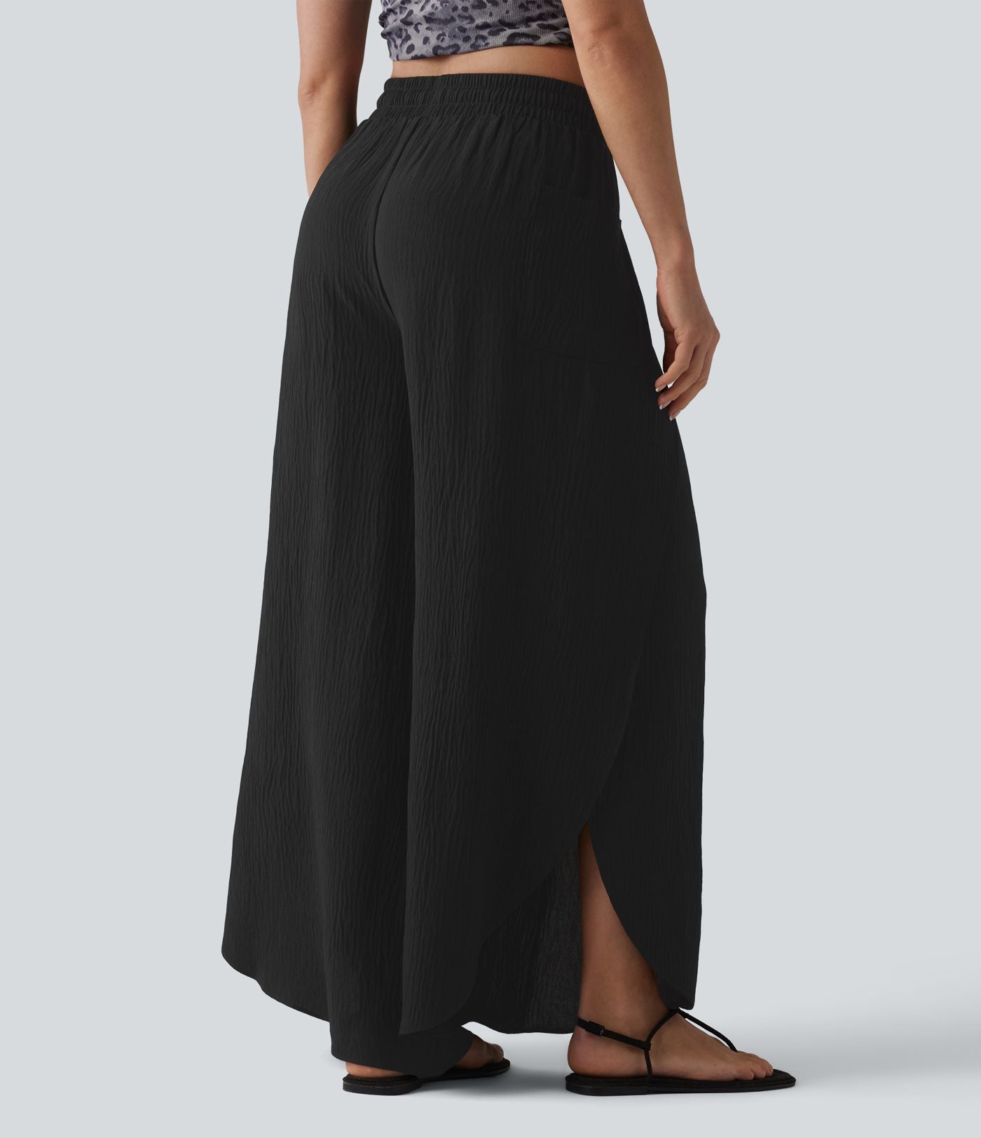 Pantalon ample décontracté à taille mi-haute, fentes, aspect lin, cordon de serrage et poches