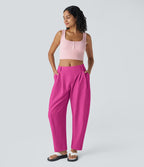 Pantalon tailleur ample, taille moyenne, coupe barrel, à poches