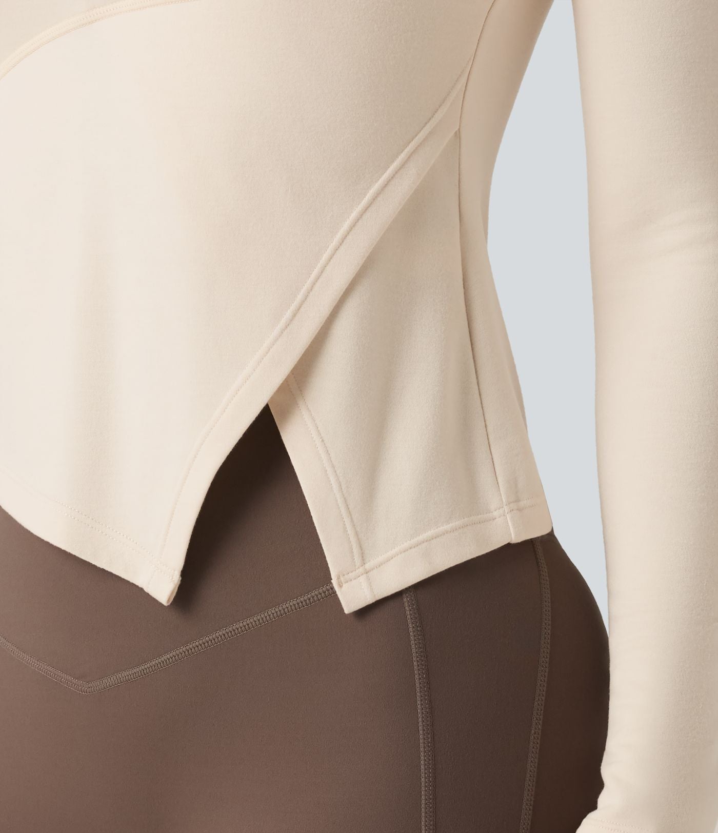 Halara HeatCore Haut de sport chauffant col rond manches longues ourlet asymétrique