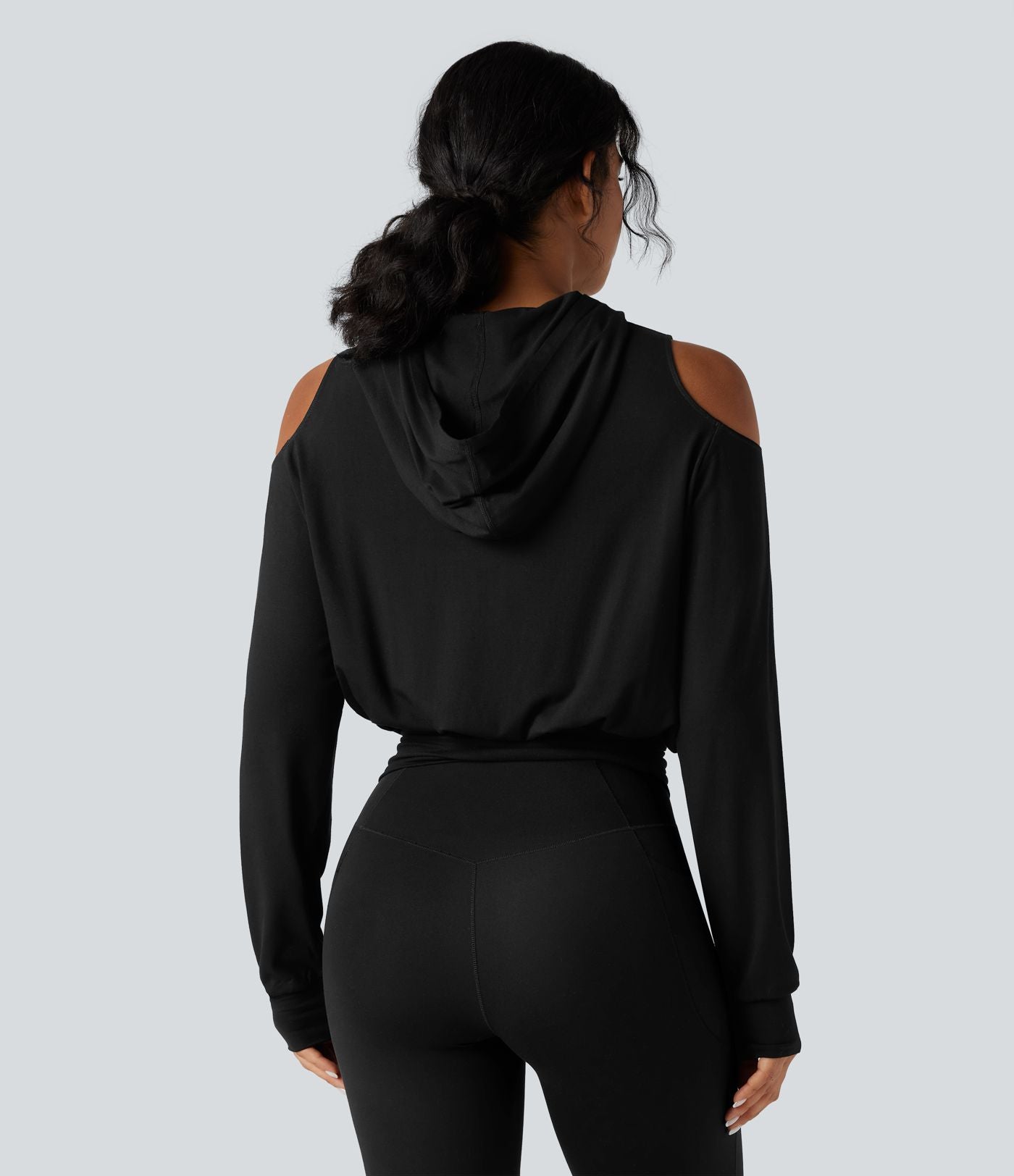 Sweat-shirt de sport à capuche épaules dénudées manches longues