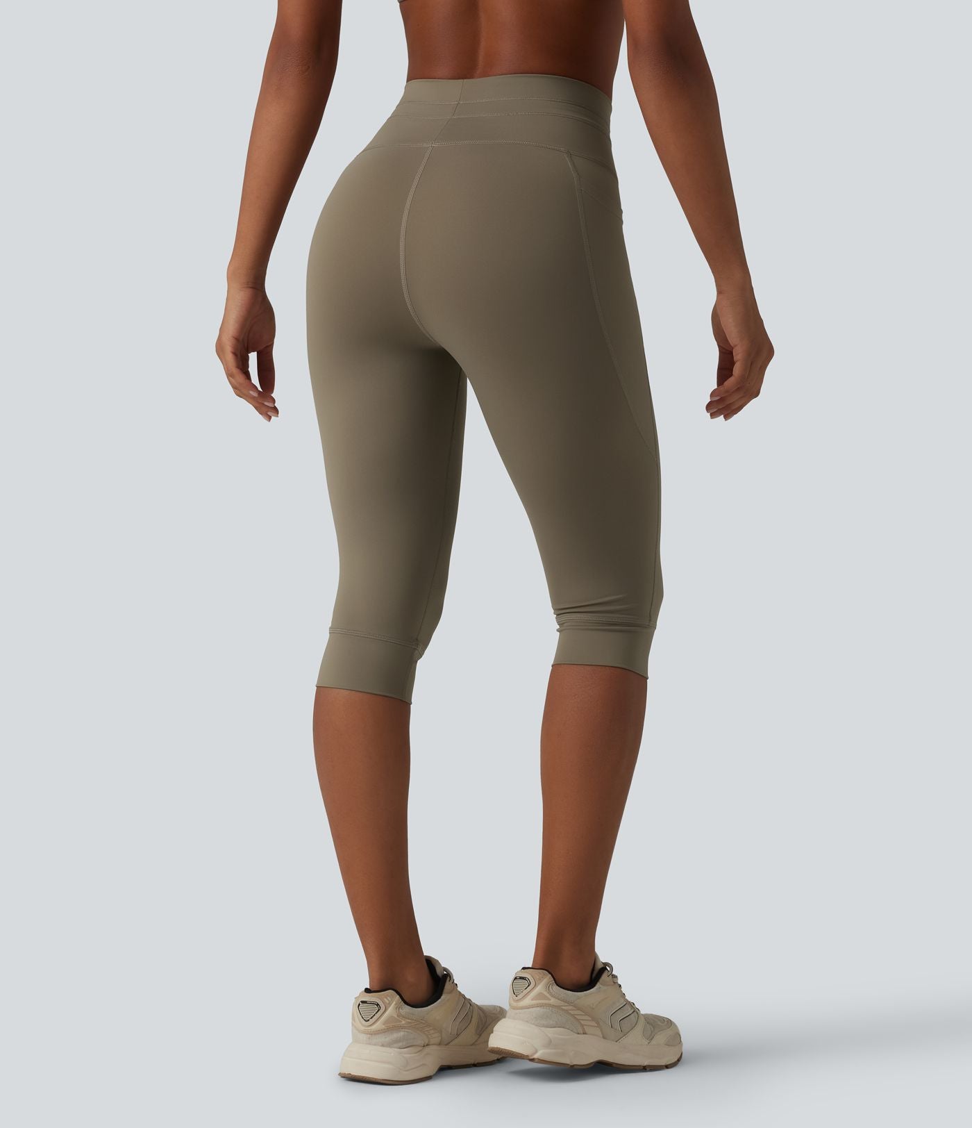 Legging yoga uni corsaire taille haute avec cordon de serrage et poches