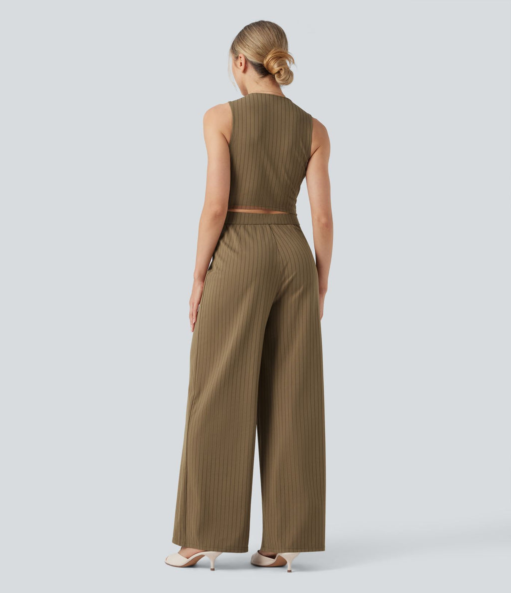 Combinaison tailleur rayée à jambes larges, décolleté en V, découpe et poches