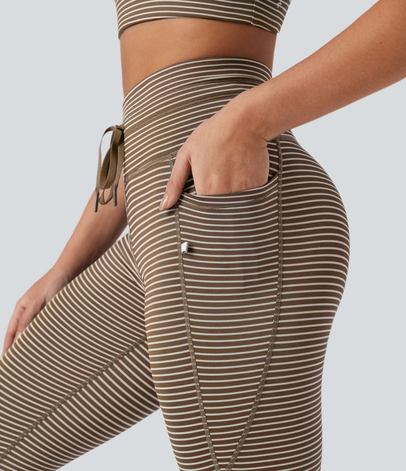 Legging de yoga rayé taille haute avec cordon de serrage et poches