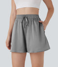 Short décontracté ample en satin à taille haute avec cordon de serrage et poches latérales