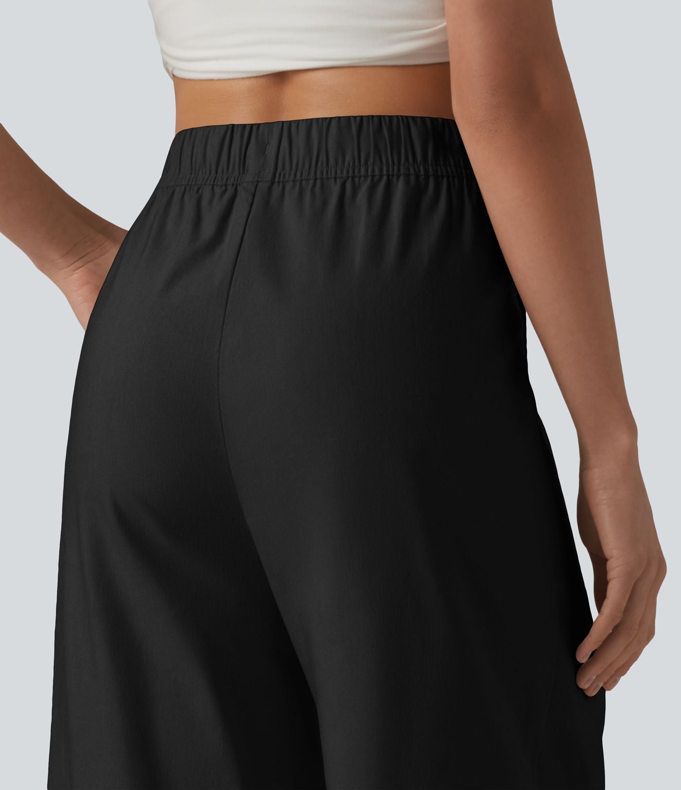 Pantalon casual court en coton et lin taille haute coupe ballon avec cordon de serrage et poches