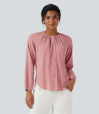 Blouse texturée col rond manches longues ourlet arrondi