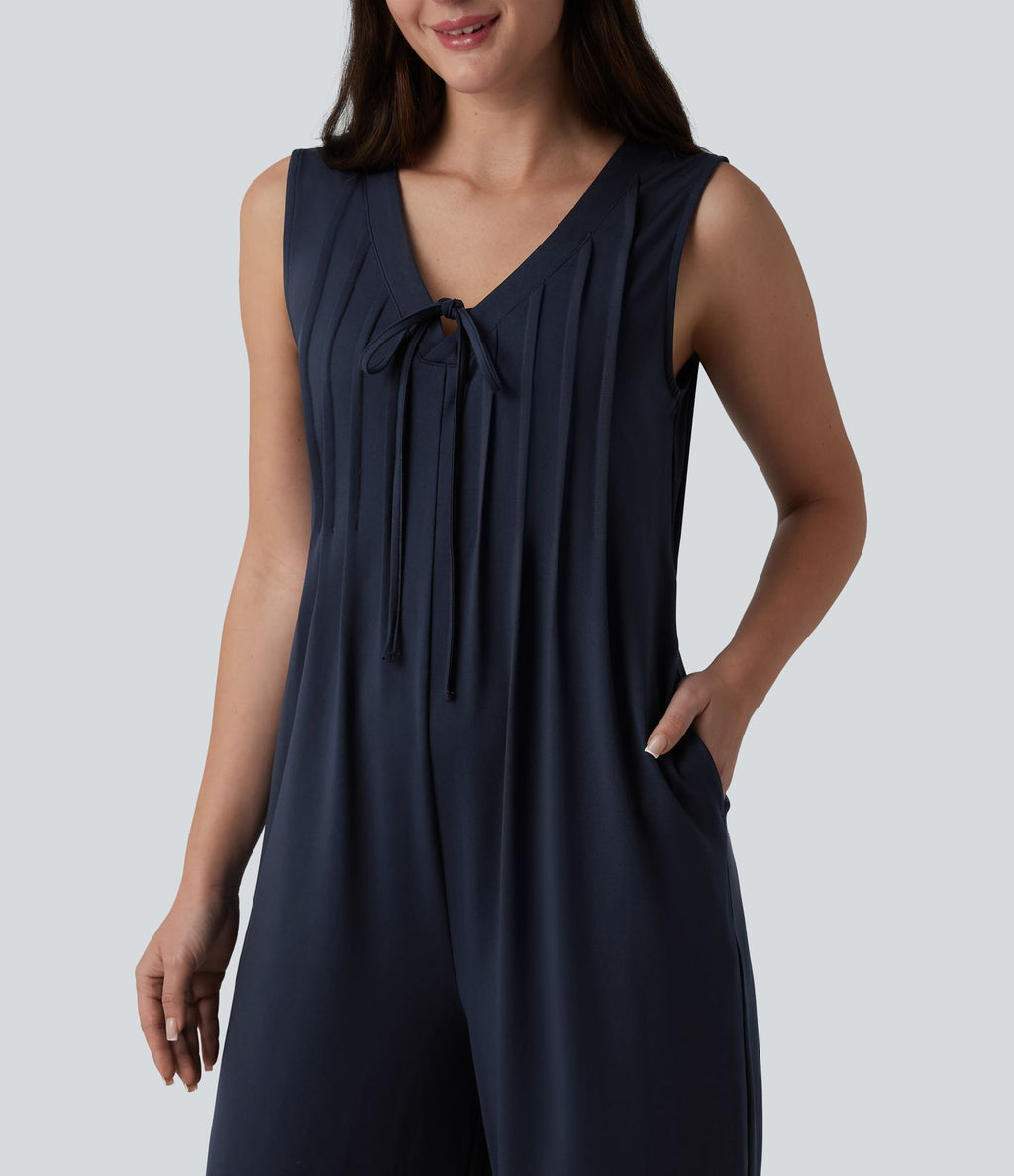 Combinaison casual ample décolleté plongeant sans manches plissée à nœud devant et fermeture éclair invisible avec poches
