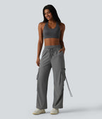 Pantalon cargo large fluide d'entraînement taille haute avec cordon de serrage, séchage rapide, à effet frais InstantCool et poches, protection solaire UPF40+