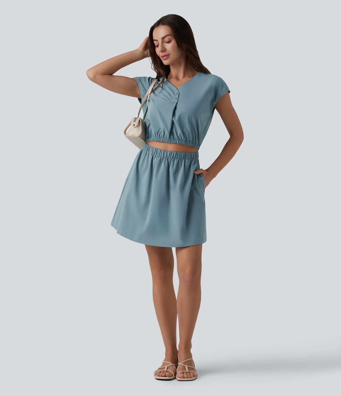 Robe col V manches courtes à découpes en popeline extensible avec poches
