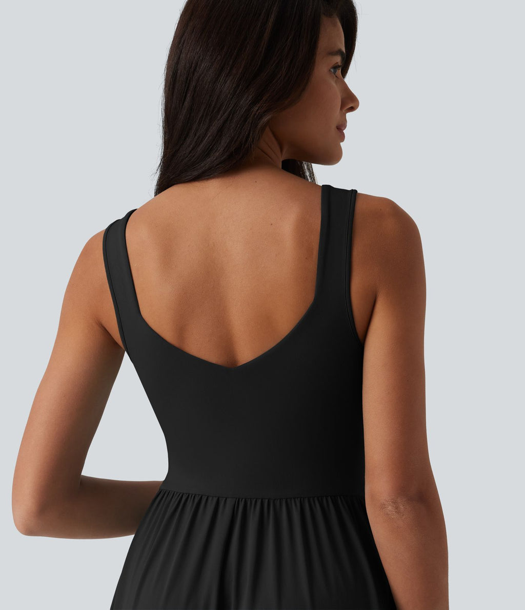 Robe midi fluide sans manches dos croisé, avec brassière intégrée (Bonnets E-G) et poches